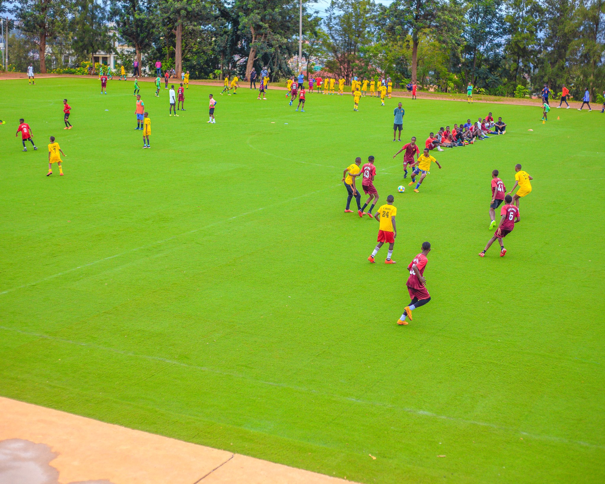 Youth teams lined up at Amahoro Stadium before a match
